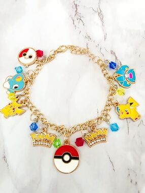 Pokemon Gold Charm Bracelet Pikachu Vaporeon & Poke Ball Link Chain